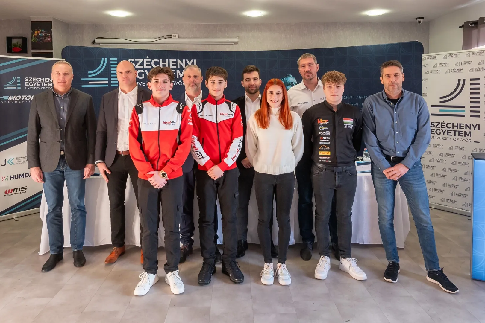 Dr Tamás Gyömörei, president of the Széchenyi István University Sports Association (SZESE) and head of the university’s Sports and Recreation Centre, Dr Dániel Feszty, Head of the Department of Vehicle Development, go-kart racer Bende Szabó, Vilmos Willisits, owner of EKART RING and team leader of UNI Győr WMS, go-kart racer Viló Willisits, Dr Tamás Kolossváry, Head of the Győr Innovation Park at Széchenyi University, racing driver Eszter Németh, Dr Ferenc Szauter, Head of the University’s Automotive Industry Research Centre, junior rally driver Bence Hidvégi and his mentor, rally driver Róbert Bútor, were all present at the event (Photo: András Adorján)